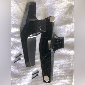 Pair black TV feet, never used.